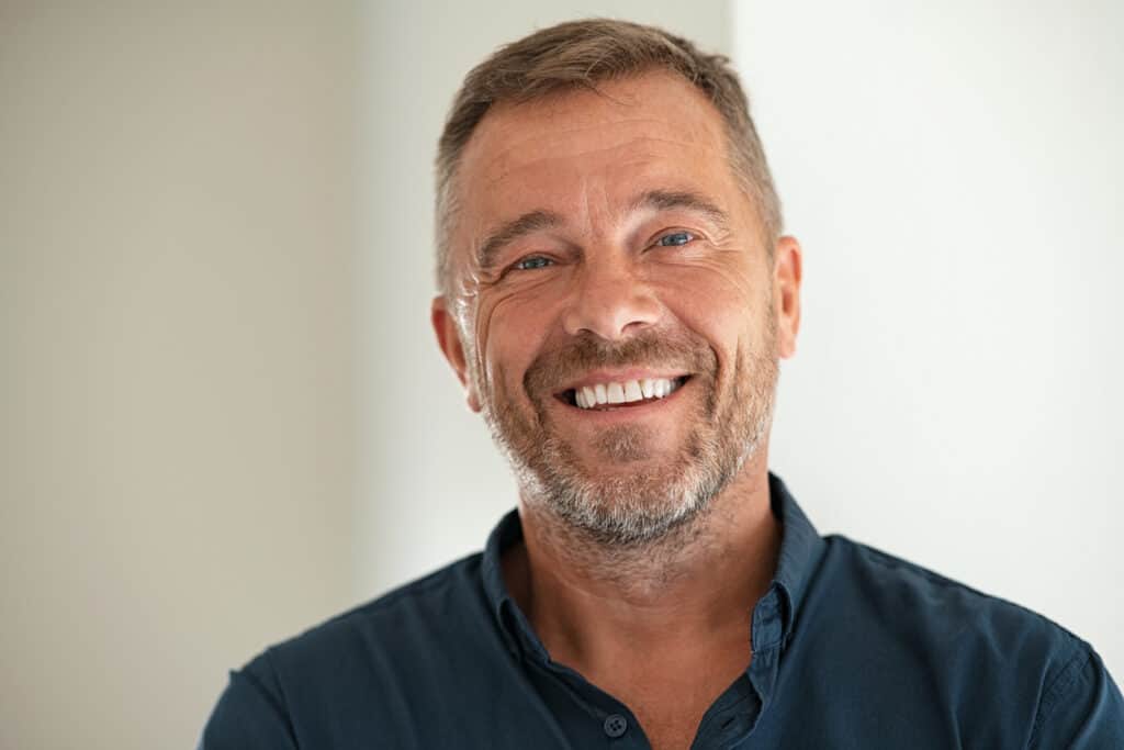 Man smiling after dental restoration